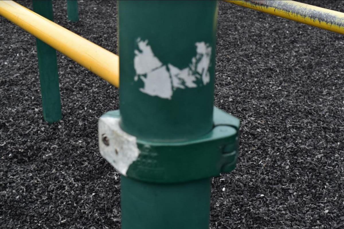 Chipping Paint on Equipment at the Elementary Playground